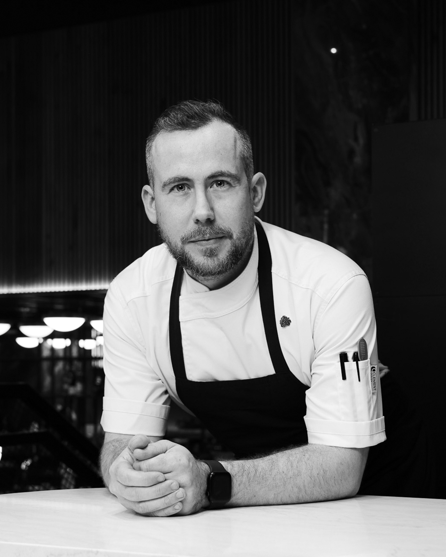 Black and white portrait of Chef Luc Le Gourvellec